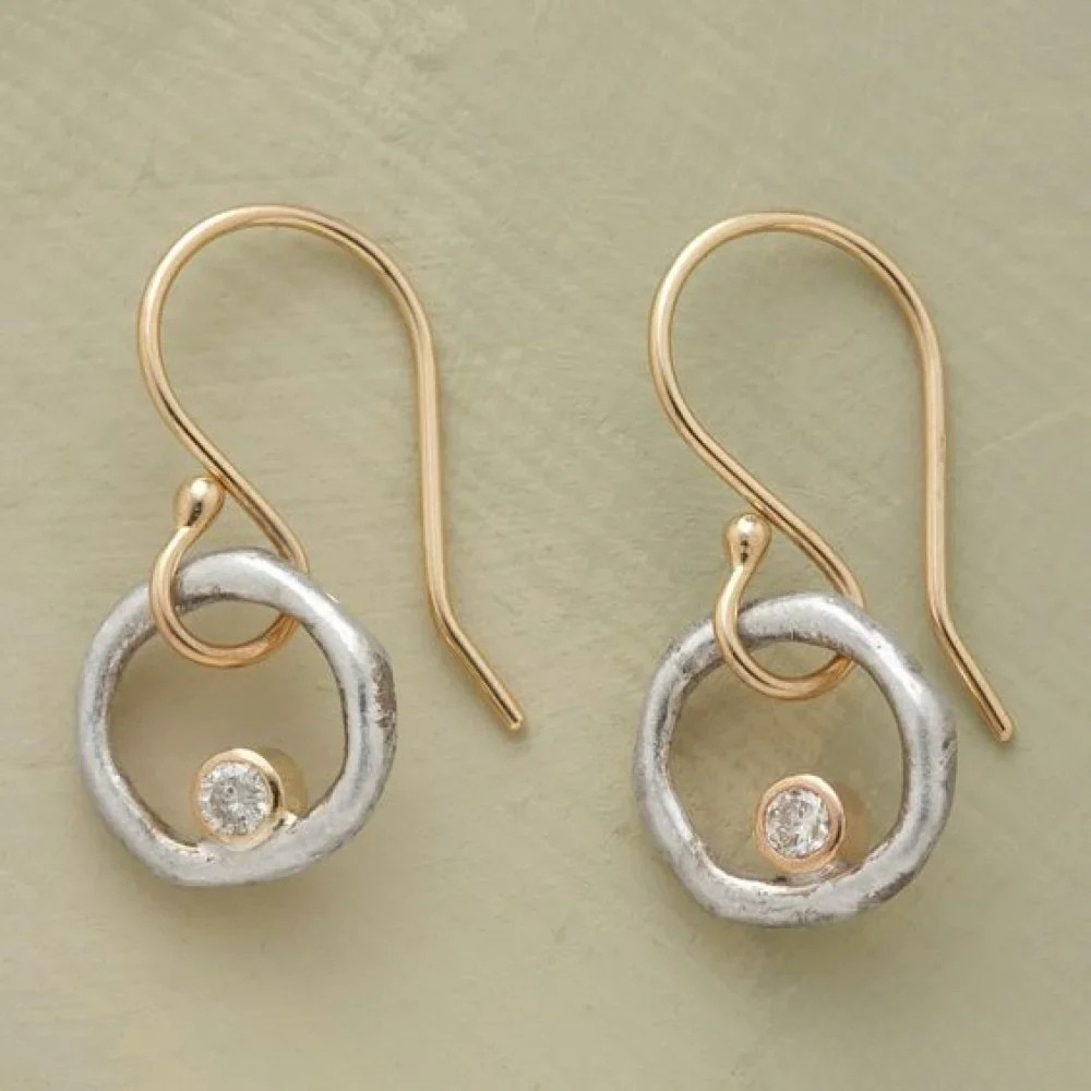 Boucles d'oreilles clous vintage en or et argent avec zirconia